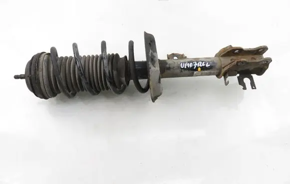 Opel Corsa D Front shock absorber with coil spring 