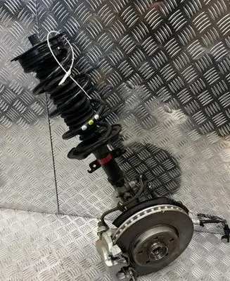 Renault Kangoo III Front shock absorber with coil spring