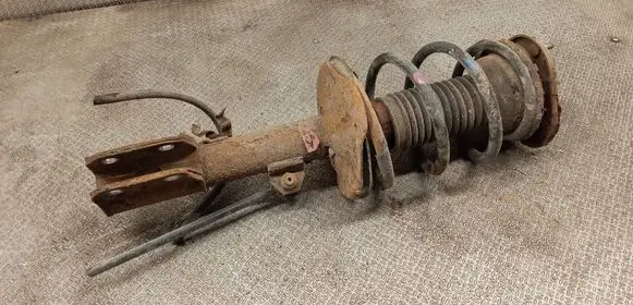 Toyota Avensis T250 Front shock absorber with coil spring 