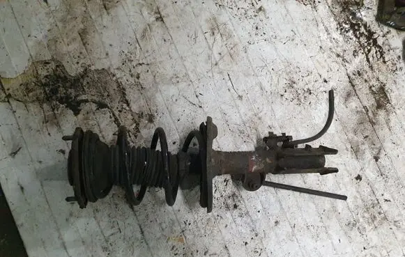 Toyota Avensis T270 Front shock absorber with coil spring NOCODE
