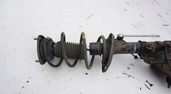 Front shock absorber with coil spring
