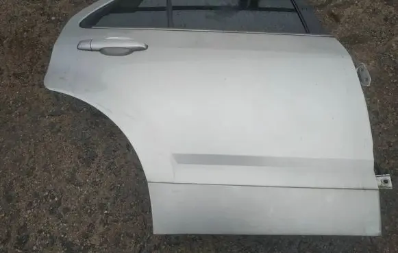 Cadillac SRX Rear door PILKOS