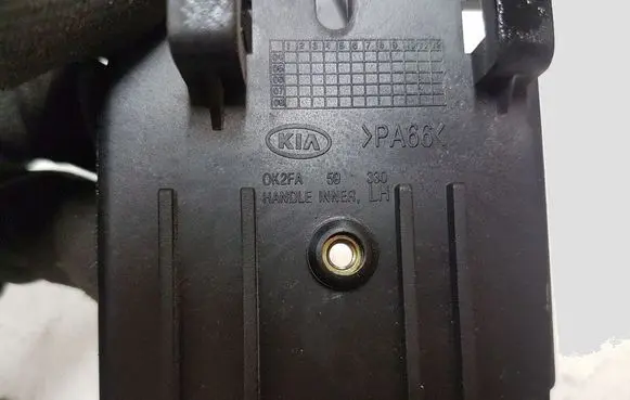 KIA Carens I Front door interior handle 0K2FA59330