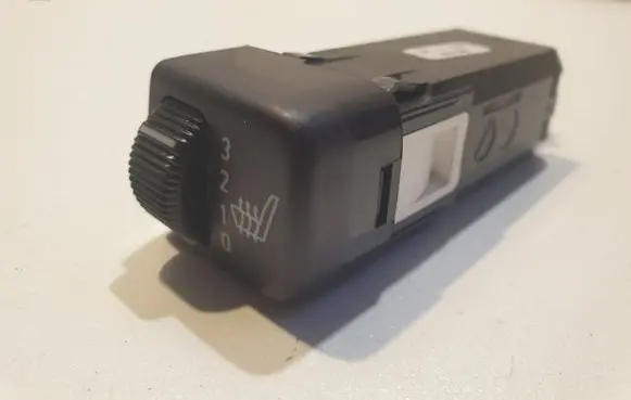 Seat heating switch