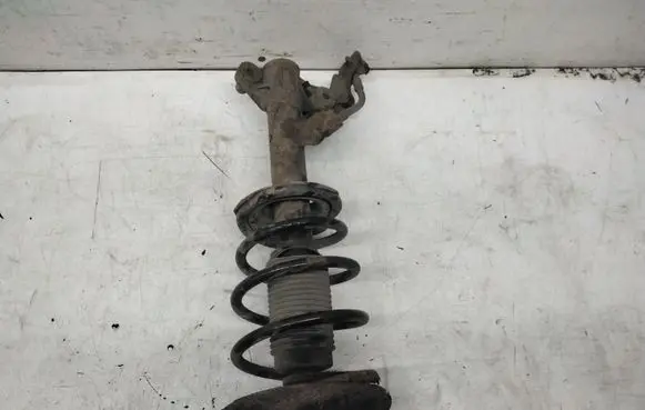 Nissan Primera Front shock absorber with coil spring