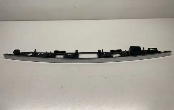 Trunk door license plate light bar