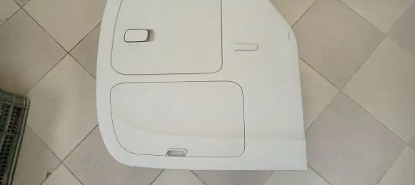 Trunk/boot lower side trim panel