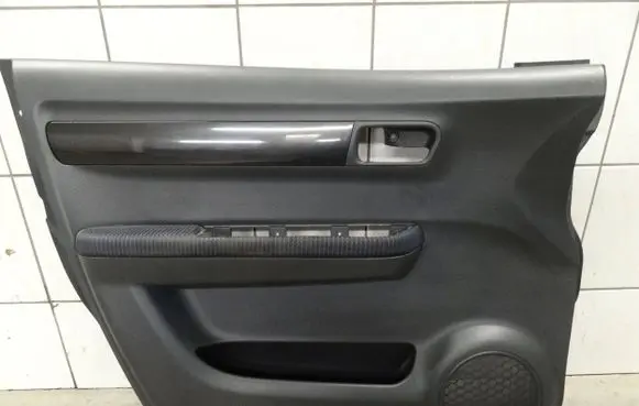 Suzuki Swift I Front door card panel trim