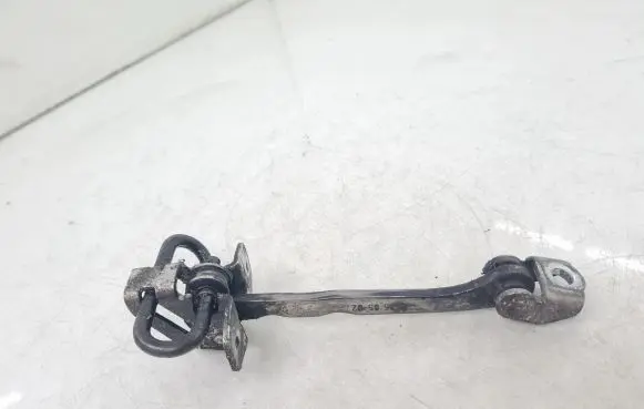 Front door check strap stopper