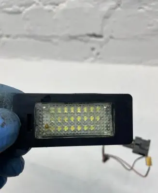 Volkswagen PASSAT B7 Number plate light