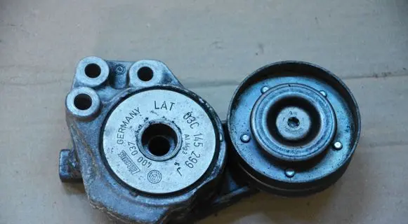 Volkswagen Polo V 6R Generator/alternator belt tensioner 03C145299J