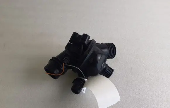 Thermostat/thermostat housing
