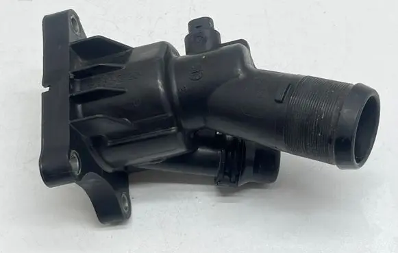 Thermostat/thermostat housing