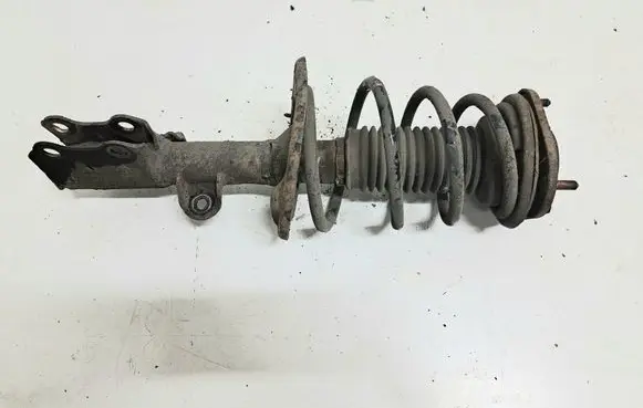 Front shock absorber with coil spring