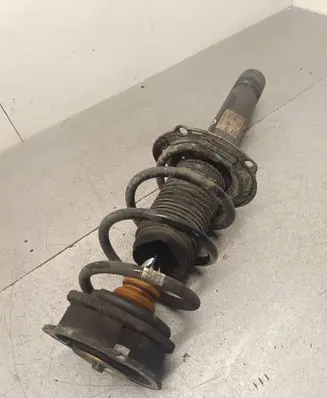 Front shock absorber with coil spring