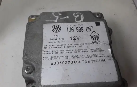 Volkswagen PASSAT B5 Airbag control unit/module 1J0909607 5WK4199