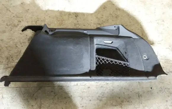 Trunk/boot lower side trim panel