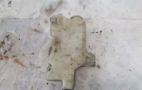 Mazda 121 Windshield washer fluid reservoir/tank 860141207