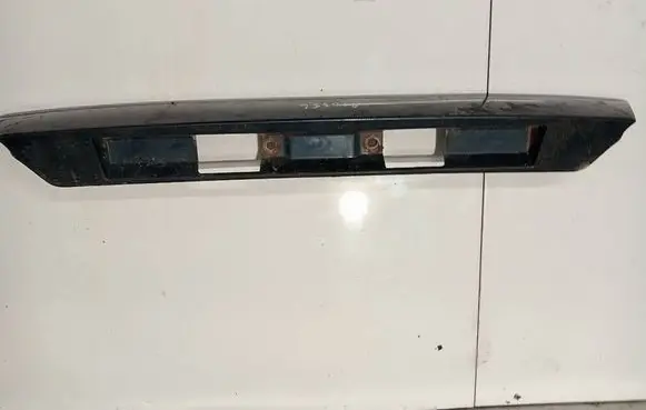 Mazda 626 Trunk door license plate light bar GE5A50811