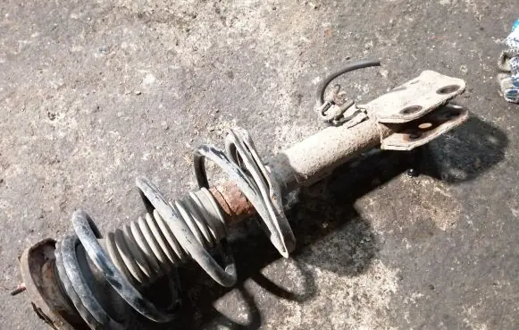 Toyota Corolla Verso AR10 Front shock absorber with coil spring
