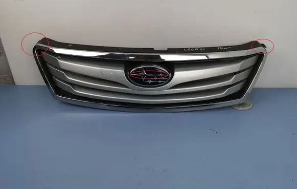 Subaru Legacy Front bumper upper radiator grill 91121AJ020