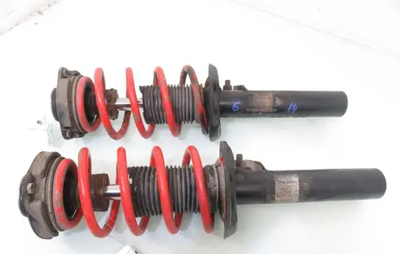 Audi A3 S3 8P Front shock absorber with coil spring 1T0412103A