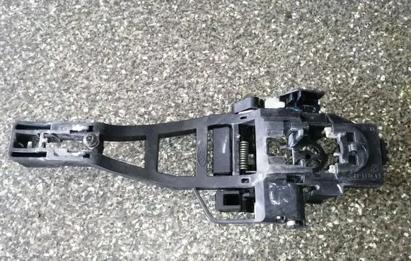 Rear door exterior handle/bracket