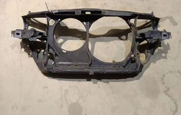 Radiator support slam panel