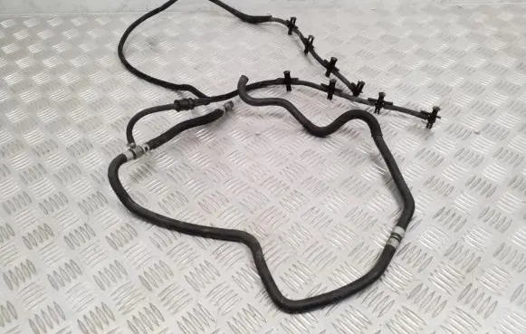 Volkswagen Touareg II Fuel return line/hose 057130218N