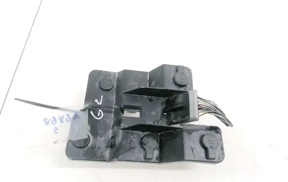 Tail light bulb cover holder