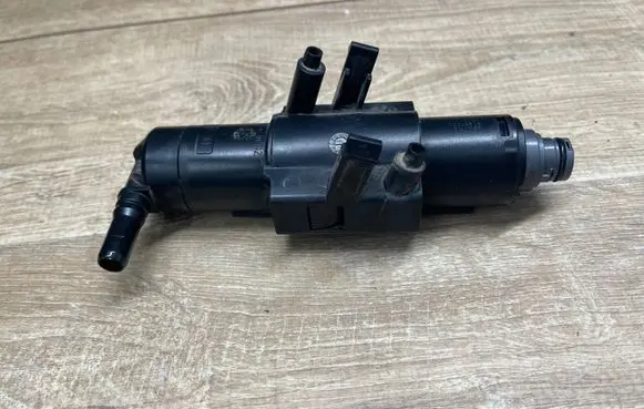 Ford Kuga II Headlight washer spray nozzle GV4113L014AE