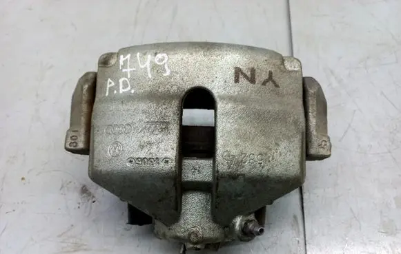 Volkswagen Jetta VI Front brake caliper 582 1506