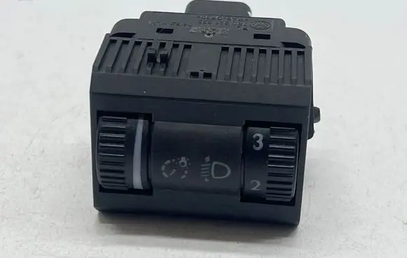 Headlight level height control switch