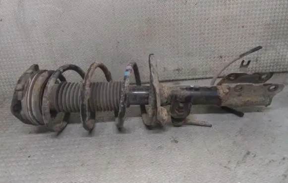 Front shock absorber with coil spring