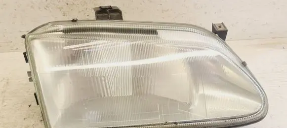 Renault Megane I Headlight/headlamp 7701672735 077008311463M E24706