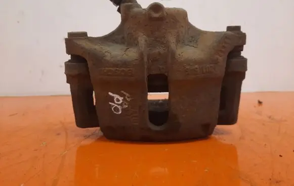 Nissan Kubistar Front brake caliper 21646