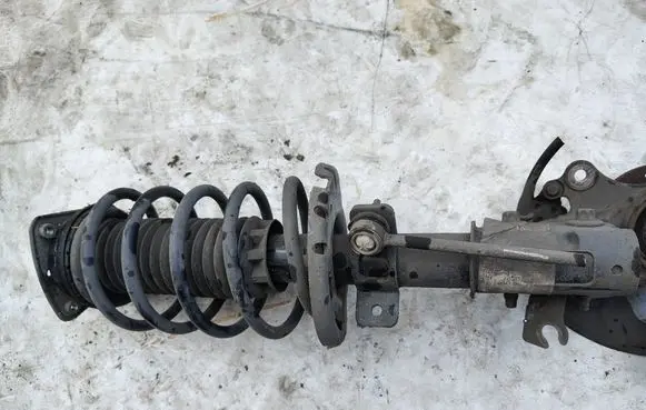 Peugeot 308 Front shock absorber with coil spring 