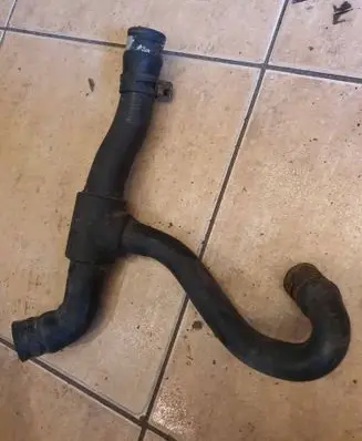 Volkswagen PASSAT B5 Engine coolant pipe/hose 028121053K