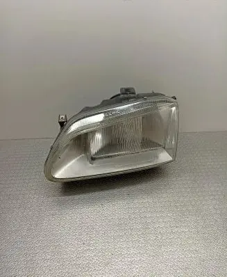 Renault Scenic I Headlight/headlamp 7701672734