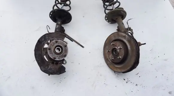 Front wheel hub spindle knuckle