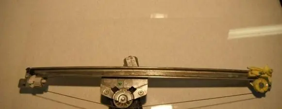 Sliding door window regulator with motor