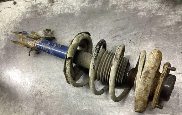 Nissan X-Trail T30 Rear shock absorber with coil spring 