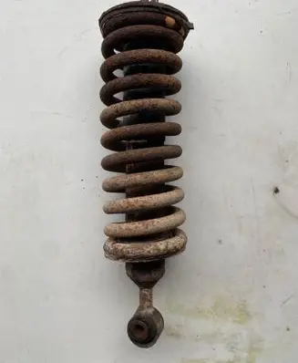 Nissan Pathfinder R51 Front shock absorber with coil spring