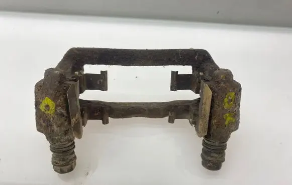 Subaru Outback Brake caliper pad carrier rear 