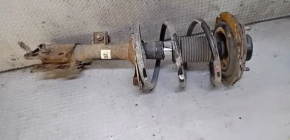 Front shock absorber with coil spring