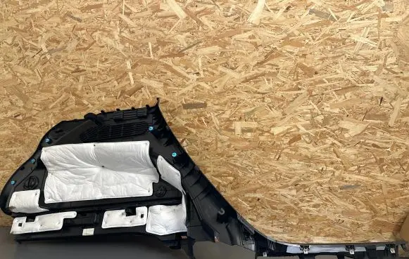 Trunk/boot lower side trim panel