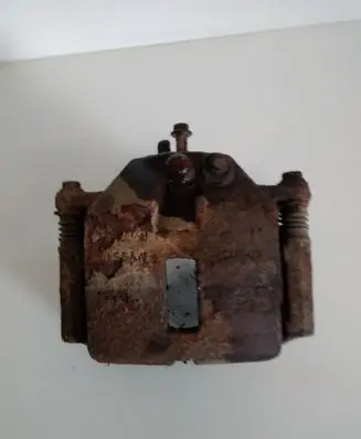 Nissan Almera Tino Front brake caliper 410114U100