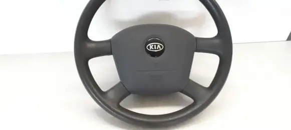 KIA Carens I Steering wheel 0K2FB57K00 K2FA57K50