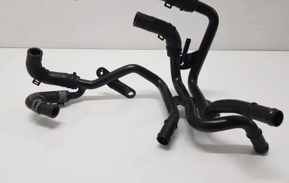 Volkswagen Golf VII Engine coolant pipe/hose 04L121064AM