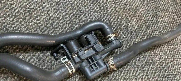 Coolant heater control valve